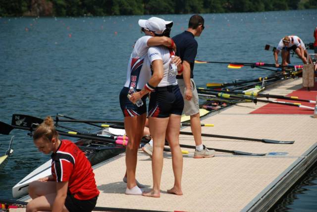 Congratulatory hug after the Finals race; Awards Ceremony dock